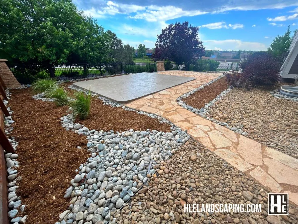 Flagstone Patio Installation in Aurora, CO | HLE Landscaping & Concrete